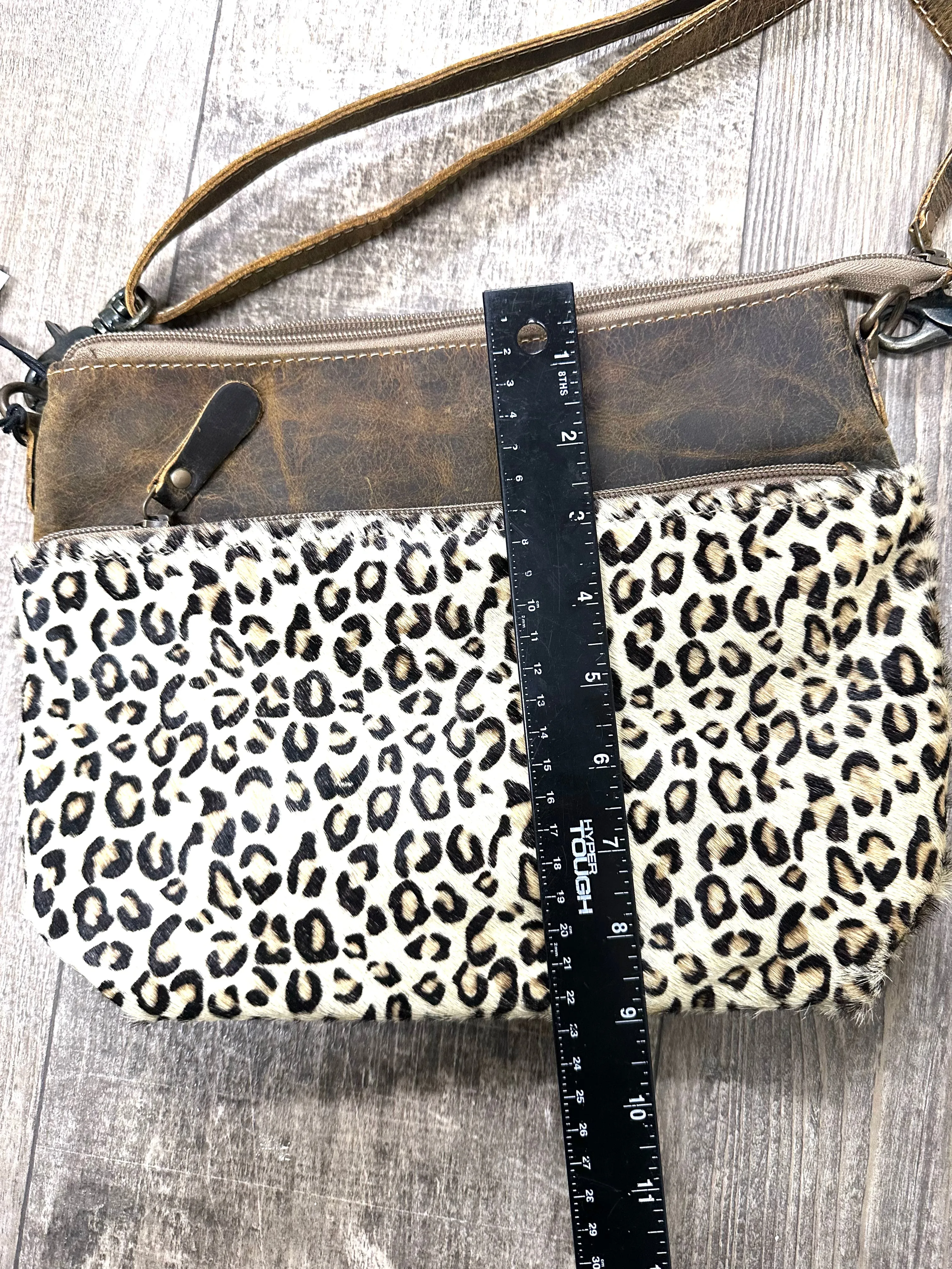 Cowhide and leather cheetah cross body  bag with leather strap